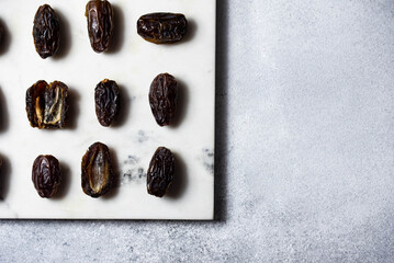 Dates fruit pattern on white background. Dried organic Superfood.