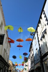 Colorful umbrellas at Caernarfon at River Seiont, Wales United Kingdom