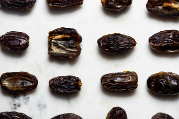 Dates fruit pattern on white background. Dried organic Superfood.