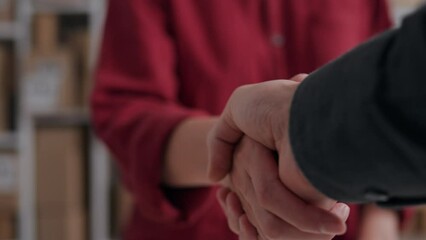 Colleagues handshake gesture about the robot handshake gesture of cargo industry business workers, business colleagues are welcome at the beginning of the working day, greeting handshake of two people