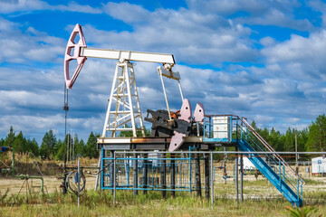 A single-shoulder rocking machine at an oil field. Oil and gas production.