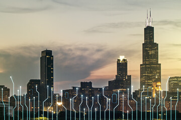 Double exposure of abstract virtual circuit hologram on Chicago city skyscrapers background....