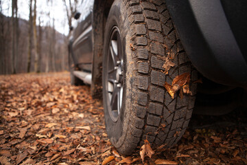 black SUVs in the mountains