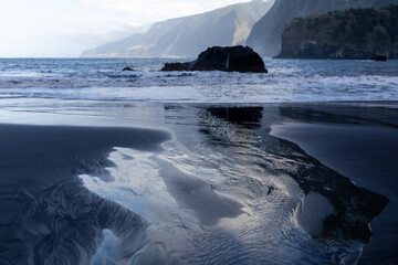 Fototapeta na wymiar black sand beach of Madeira view on mountains