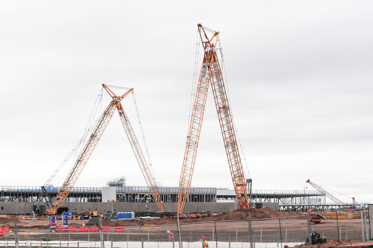 Tower cranes rise over construction site of Meta Mesa Data Center in Mesa, Arizona in 2022