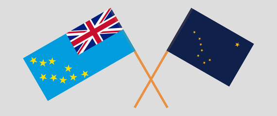 Obraz premium Crossed flags of Tuvalu and the State of Alaska. Official colors. Correct proportion