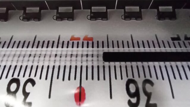Oracal photo printing. printer prints photo of thermometer advertising sticker