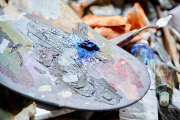 artist in his studio with brush
