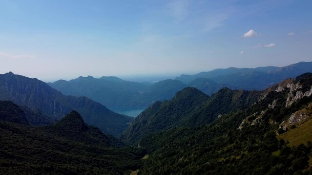 Aerial Shot Of Distant Mountains By Como Lake, Porta Di Prada Plave, Italy