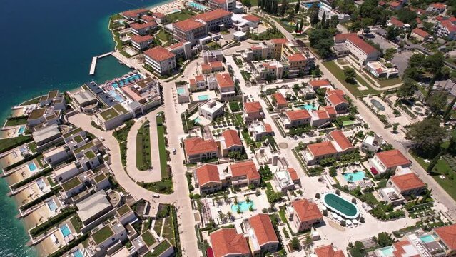 Portonovi Resort, Montenegro. Aerial View of Luxury Villas, Pools and Coastline on Sunny Summer Day