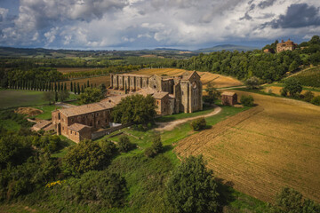 Aerial view of the abbey of San Galgano: is located about 25 miles from Siena, in southern Tuscany, Italy, Siena region - September, 2022 - obrazy, fototapety, plakaty