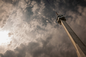 Panorama of the avala hill skyline with a focus on Avala tower, or Avala toranj, seen from below....