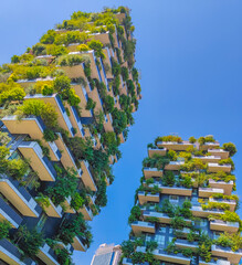 Fototapeta premium Bosco Verticale in Milan Porta Nuova district also known as Vertical forest skyscrapers. Residential buildings with many trees and other plants in balconies. Ecological green skyscraper