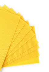Natural organic beeswax sheets on white background, top view