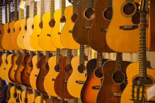 Amsterdam, Netherlands. August 2022. Displayed guitars in a music store. - Powered by Adobe