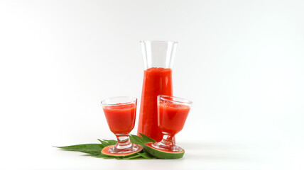 Papaya smoothie in glass jar and glasses on white background diet vegetarian healthy and freshness drink concept soft and selective focus