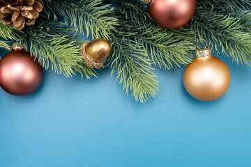 Christmas composition. festive decor on blue background. Copy space, flat lay, top view.