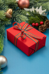 Christmas composition. festive decor on blue background.