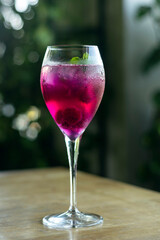 raspberry and red dragon fruit prosecco wine spritzer cocktail