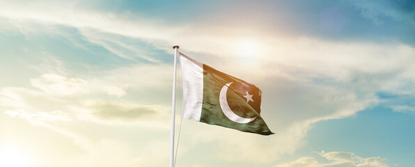 Waving Flag of Pakistan with beautiful Sky.