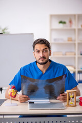 Young male doctor radiologist working in the clinic