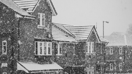 It's snowing in the city, black and white photo