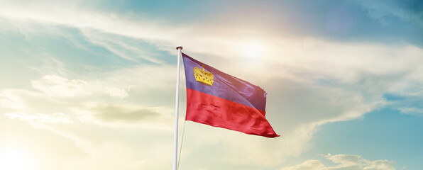 Waving Flag of Liechtenstein with beautiful Sky.