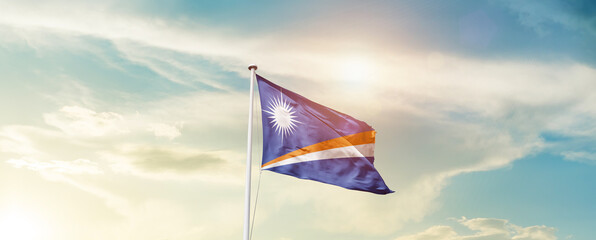 Waving Flag of Marshall Islands with beautiful Sky.