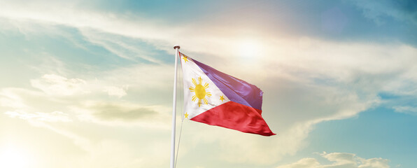 Waving Flag of Philippines with beautiful Sky.