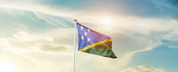 Waving Flag of Solomon Islands with beautiful Sky.