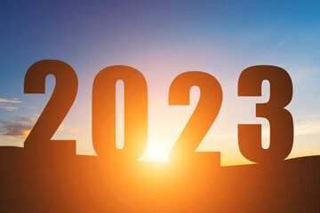 Happy New Year Numbers 2023, Silhouette the hill early morning sunrise over the horizon background,...