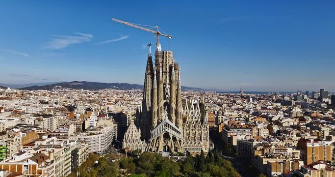 Aerial footage of Sagrada Familia Spain on a sunny day 