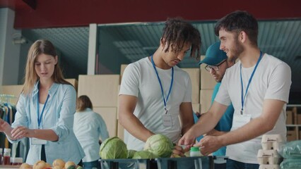 The Concept of Social Aid. Group of Volunteers Preparing Humanitarian Aid for Poor People in Need. Charity Workers and Members of the Community Work Together. Concept of Giving,