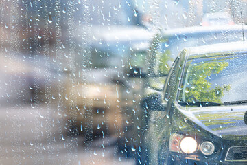 water drops window rain car traffic night, November weather