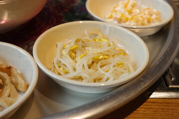 Boiled bean sprouts are served as a side dish.
