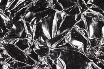 crumpled foil abstract background black and white silver effect