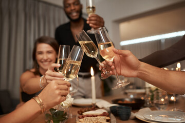 Dinner party, friends and cheers with wine glass for celebration, social gathering or new years event at home. Happy group of people toast alcohol, champagne and drinks to celebrate together at night - obrazy, fototapety, plakaty