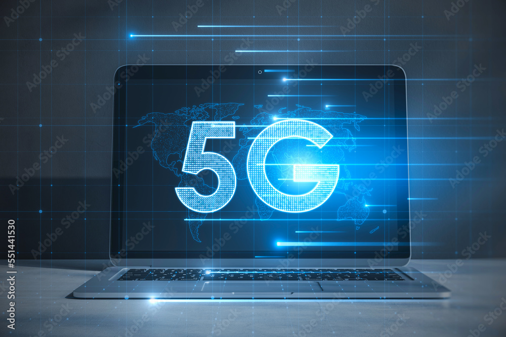 Poster Close up of laptop with glowing 5G hologram on blurry background. Wireless internet and web speed concept. 3D Rendering.