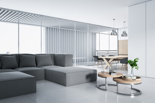 Clean white studio interior with panoramic window and city view, furniture and daylight. 3D Rendering.