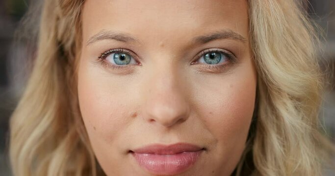 Woman face, blue color eyes and focus, vision and contact lenses of eye care, sight or awareness in Russia. Portrait of girl blink in optometry test, perception and human anatomy, cosmetics or beauty