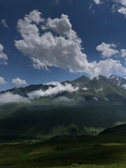 Obraz na płótnie Canvas mountains and clouds