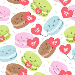 Seamless vector pattern. Pattern for Valentine's Day products. Pattern with macaroons with hearts. Lettering I love you. 