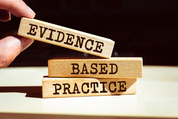 Wooden blocks with words 'Evidence based practice'.