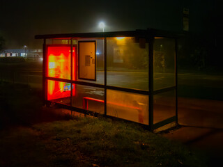 UK bus stop at night with an orange glow in Bracknell Forest Berkshire © RW Jemmett