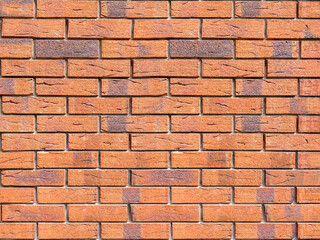 Obraz premium brick wall background. abstract background texture with decorative smooth red brickwork.