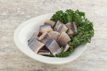 Herring fillet slice on the bowl