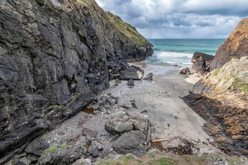 Soapy Cove on the lizard peninsular Cornwall showing water falls seals and their pups 