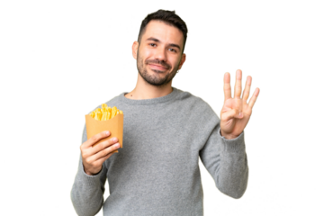 Young caucasian man holding fried chips over isolated chroma key background happy and counting four with fingers