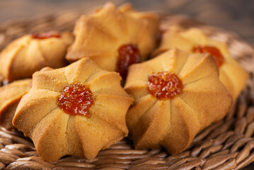 Sweet butter cookies for breakfast on a wicker tray.