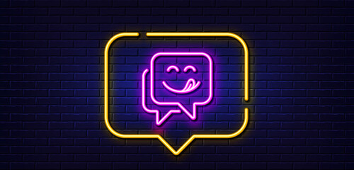 Neon light speech bubble. Yummy smile line icon. Emoticon with tongue sign. Speech bubble symbol. Neon light background. Yummy smile glow line. Brick wall banner. Vector